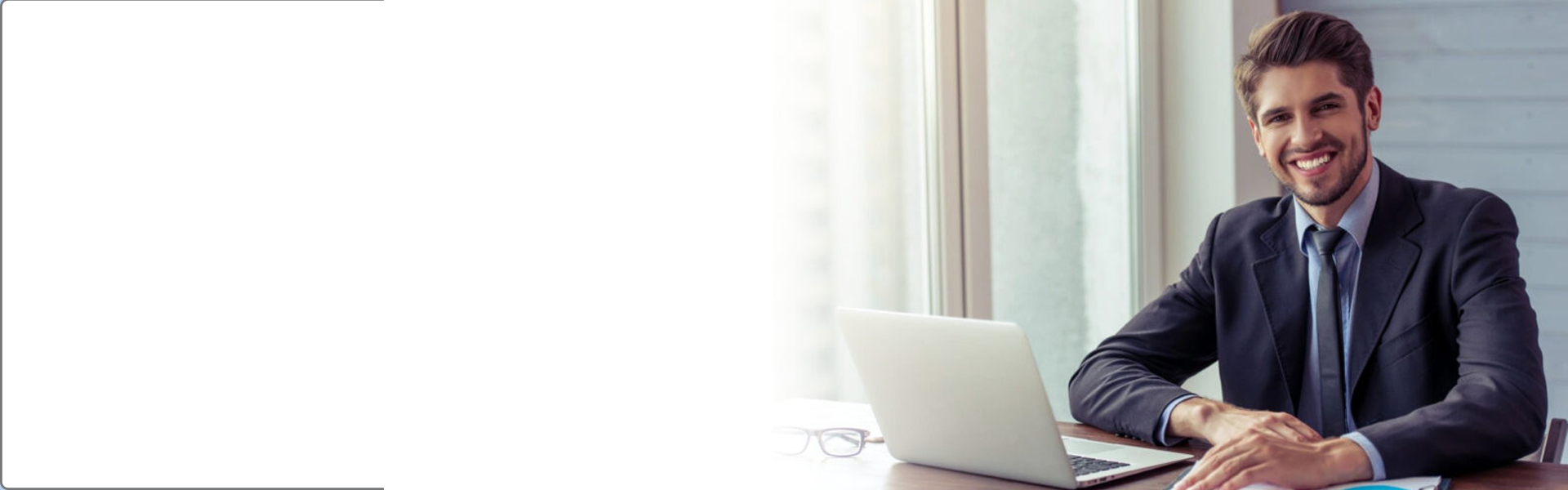 Businessman at his laptop reviewing investment portfolio.